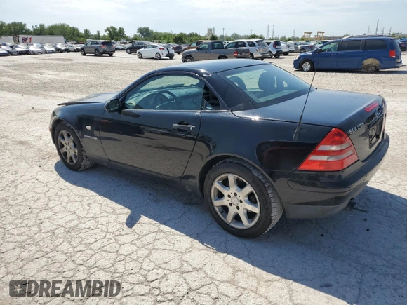 1999 Mercedes-Benz SLK-Class with VIN WDBKK47F5XF129037, listed as a Copart auction lot 68842504 with 74,397 mi miles and Salvage Title. Bid and sale history available at carsss.com. Image 2.