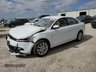 2014 Volkswagen Jetta Sedan SE w/Connectivity with VIN 3VWD07AJ2EM431586, listed as a Copart auction lot 48257215 with 75,418 mi miles and Salvage Title. Bid and sale history available at carsss.com. Image 1.