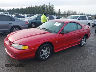 1996 Ford Mustang with VIN 1FALP4042TF223781, listed as a IAAI auction lot 41197025 with 116,106 mi miles. Bid and sale history available at carsss.com. Image 2.