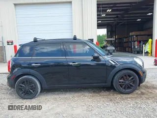 2016 MINI Countryman S z VIN WMWZC3C58GWP53495, wystawiony jako IAAI lot #42134455 z przebiegiem 92 862 mil mil oraz . Historia ofert i sprzedaży dostępna na DreamBid. Obrazek 13.