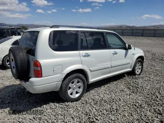2003 Suzuki XL7 Touring with VIN JS3TX92V034109417, listed as a Copart auction lot 52672475 with 96,760 mi miles and Salvage title. Bid and sale history available at DreamBid. Image 3.