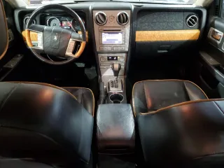 2009 Lincoln MKZ z VIN 3LNHM28T79R629555, wystawiony jako Copart lot #43765295 z przebiegiem 159 033 mil mil oraz Szkoda całkowita • Salvage title. Historia ofert i sprzedaży dostępna na DreamBid. Obrazek 8.