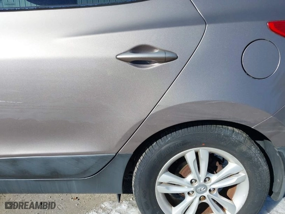 2013 Hyundai Tucson GLS with VIN KM8JU3AC3DU683678, listed as a IAAI auction lot 41693218 with NaN miles. Bid and sale history available at carsss.com. Image 15.