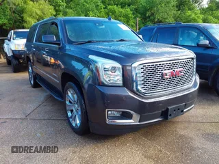 2015 GMC Yukon XL Denali with VIN 1GKS2JKJ5FR719302, listed as a IAAI auction lot 42103612 with 1 mi miles. Bid and sale history available at carsss.com. Image 1.