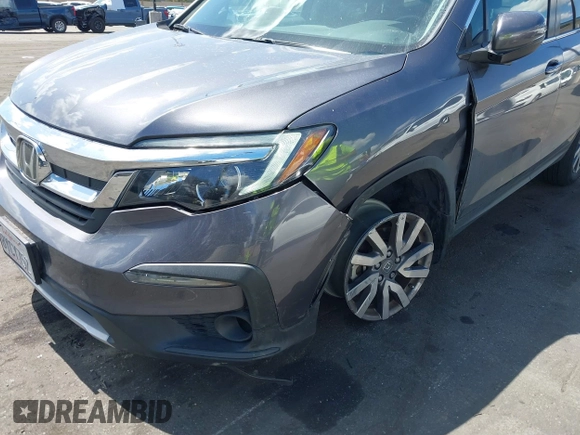 2021 Honda Pilot EX-L with VIN 5FNYF5H57MB046740, listed as a IAAI auction lot 41943366 with 31,198 mi miles and . Bid and sale history available at DreamBid. Image 12.