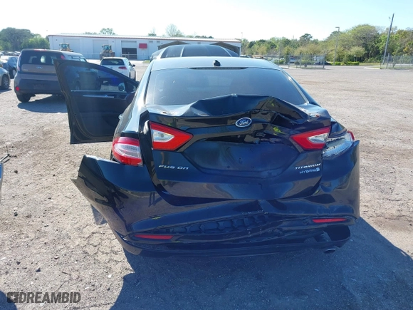 2015 Ford Fusion Titanium Hybrid with VIN 3FA6P0RUXFR119698, listed as a IAAI auction lot 41791411 with 140,646 mi miles. Bid and sale history available at carsss.com. Image 6.