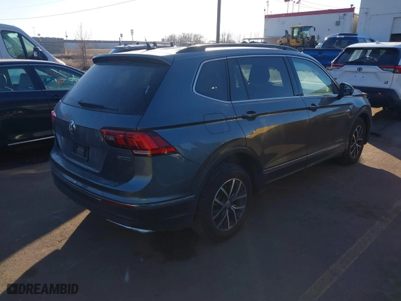 2020 Volkswagen Tiguan SE with VIN 3VV2B7AX9LM151977, listed as a IAAI auction lot 41448053 with 69,194 mi miles. Bid and sale history available at carsss.com. Image 4.