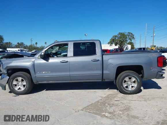 2016 Chevrolet Silverado 1500 LT with VIN 3GCUKREC8GG219524, listed as a IAAI auction lot 41087657 with 123,010 mi miles and . Bid and sale history available at DreamBid. Image 14.