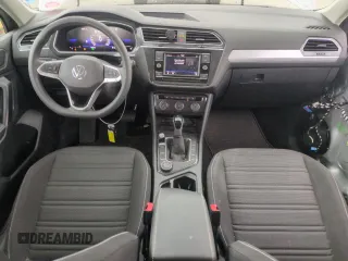 2023 Volkswagen Tiguan S with VIN 3VVFB7AXXPM103928, listed as a Copart auction lot 57119895 with 13,820 mi miles and Salvage title. Bid and sale history available at DreamBid. Image 8.