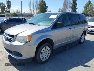 2014 Dodge Grand Caravan SE 30th Anniversary with VIN 2C4RDGBG7ER285646, listed as a IAAI auction lot 41932716 with 161,260 mi miles and . Bid and sale history available at DreamBid. Image 2.