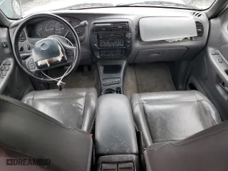 2000 Mercury Mountaineer with VIN 4M2ZU86P9YUJ19811, listed as a Copart auction lot 82211724 with 251,761 mi miles and Salvage Title. Bid and sale history available at carsss.com. Image 8.