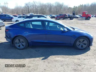 2023 Tesla Model 3 with VIN 5YJ3E1EA2PF690335, listed as a IAAI auction lot 41732701 with 22,238 mi miles and . Bid and sale history available at DreamBid. Image 13.