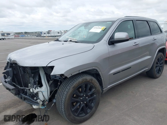 2017 Jeep Grand Cherokee Laredo with VIN 1C4RJFAG1HC701921, listed as a IAAI auction lot 42164963 with 135,039 mi miles and . Bid and sale history available at DreamBid. Image 21.