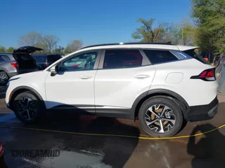 2023 Kia Sportage EX with VIN KNDPVCAG5P7077588, listed as a IAAI auction lot 42021931 with 26,195 mi miles and . Bid and sale history available at carsss.com. Image 14.