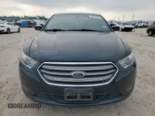 2014 Ford Taurus SEL z VIN 1FAHP2E84EG133955, wystawiony jako Copart lot #56630155 z przebiegiem 113 045 mil mil oraz Szkoda całkowita • Salvage title. Historia ofert i sprzedaży dostępna na DreamBid. Obrazek 5.