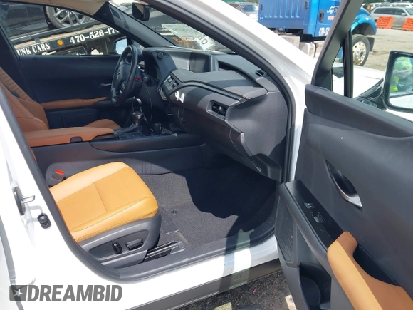 2022 Lexus UX 200 z VIN JTHP3JBH8N2055563, wystawiony jako IAAI lot #42462891 z przebiegiem 25 828 mil mil oraz . Historia ofert i sprzedaży dostępna na DreamBid. Obrazek 5.