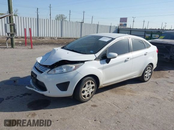 2012 Ford Fiesta SE with VIN 3FADP4BJ0CM207764, listed as a IAAI auction lot 41852699 with 143,287 mi miles. Bid and sale history available at carsss.com. Image 2.