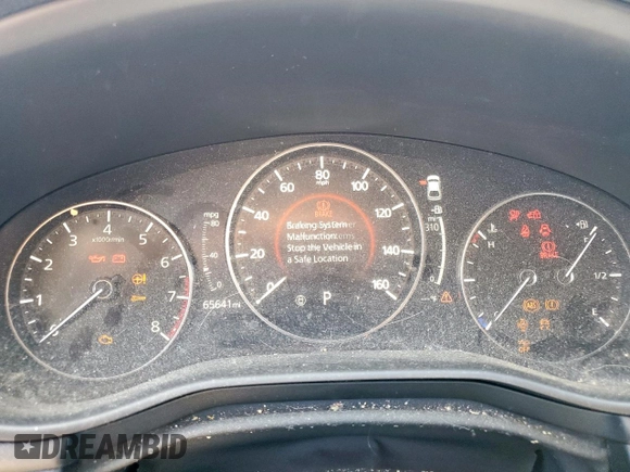 2019 Mazda 3 z VIN JM1BPAJM3K1131108, wystawiony jako Copart lot #57911165 z przebiegiem 65 641 mil mil oraz Szkoda całkowita • Salvage title. Historia ofert i sprzedaży dostępna na DreamBid. Obrazek 9.