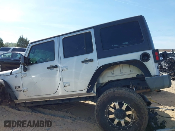 2007 Jeep Wrangler Unlimited X with VIN 1J4GA39137L114943, listed as a IAAI auction lot 42080263 with Not provided miles and . Bid and sale history available at DreamBid. Image 14.