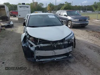 2018 Toyota C-HR XLE with VIN JTNKHMBX3J1010211, listed as a IAAI auction lot 40799443 with 104,148 mi miles. Bid and sale history available at carsss.com. Image 6.