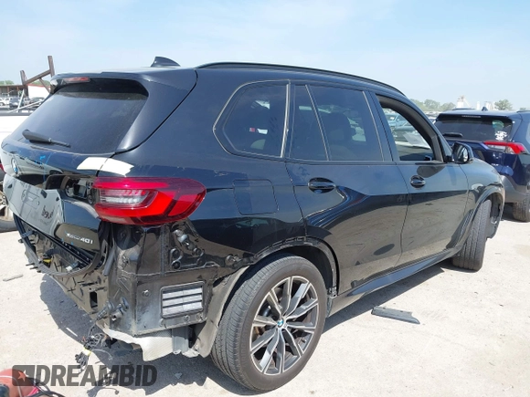 2021 BMW X5 xDrive40i with VIN 5UXCR6C01M9E66976, listed as a IAAI auction lot 42024110 with 67,877 mi miles and . Bid and sale history available at DreamBid. Image 4.