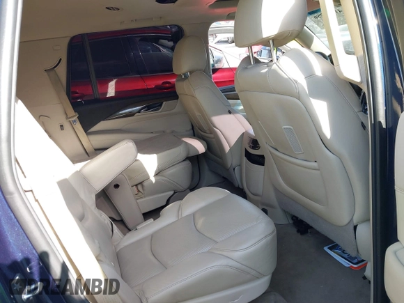 2019 Cadillac Escalade Luxury z VIN 1GYS4BKJ4KR291044, wystawiony jako IAAI lot #41818756 z przebiegiem Nie podano mil oraz . Historia ofert i sprzedaży dostępna na DreamBid. Obrazek 8.