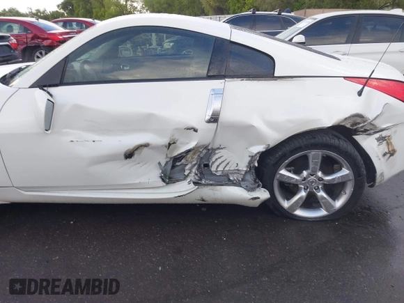 2007 Nissan 350Z Enthusiast z VIN JN1BZ34D17M501594, wystawiony jako IAAI lot #42256549 z przebiegiem Nie podano mil oraz . Historia ofert i sprzedaży dostępna na DreamBid. Obrazek 6.