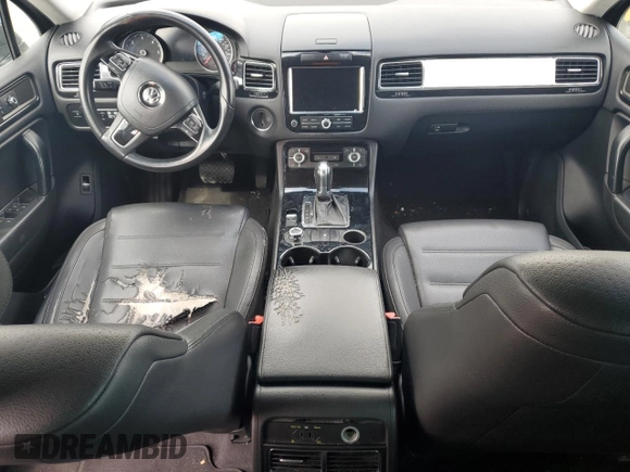 2012 Volkswagen Touareg Sport с VIN WVGEK9BP7CD006059, выставлен на аукционе Copart как лот 49411245 с пробегом 202 323 миль миль и Чистый • Clean title. История ставок и продаж доступна на DreamBid. Изображение 8.