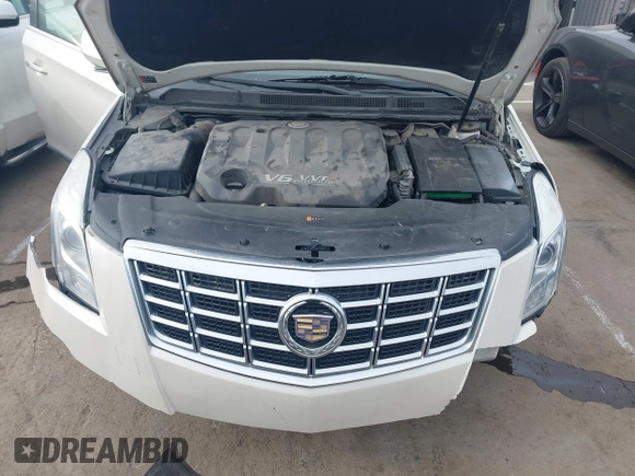 2014 Cadillac XTS Luxury with VIN 2G61M5S3XE9185493, listed as a IAAI auction lot 41711302 with 89,725 mi miles. Bid and sale history available at carsss.com. Image 10.