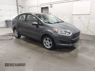 2018 Ford Fiesta SE z VIN 3FADP4BJ8JM119090, wystawiony jako IAAI lot #42208109 z przebiegiem 102 252 mil mil oraz . Historia ofert i sprzedaży dostępna na DreamBid. Obrazek 1.
