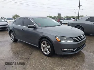 2015 Volkswagen Passat 1.8T Limited Edition with VIN 1VWAT7A34FC089282, listed as a IAAI auction lot 41767239 with 68,156 mi miles. Bid and sale history available at carsss.com. Image 1.