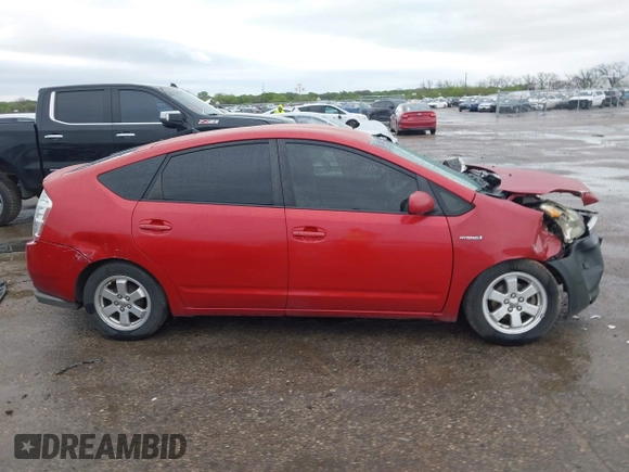 2007 Toyota Prius z VIN JTDKB20U977687630, wystawiony jako IAAI lot #41939185 z przebiegiem 392 988 mil mil oraz . Historia ofert i sprzedaży dostępna na DreamBid. Obrazek 13.