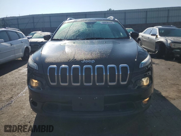 2014 Jeep Cherokee Latitude z VIN 1C4PJMCBXEW284645, wystawiony jako Copart lot #58838355 z przebiegiem 131 631 mil mil oraz Szkoda całkowita • Salvage title. Historia ofert i sprzedaży dostępna na DreamBid. Obrazek 5.