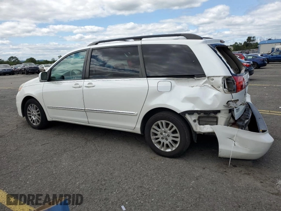 2010 Toyota Sienna XLE с VIN 5TDDK4CC5AS029985, выставлен на аукционе Copart как лот 84182164 с пробегом 232 460 миль миль и Списание • Salvage title. История ставок и продаж доступна на DreamBid. Изображение 2.