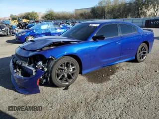 2021 Dodge Charger R/T with VIN 2C3CDXCT5MH652229, listed as a Copart auction lot 48712415 with 54,863 mi miles and Salvage Title. Bid and sale history available at carsss.com. Image 1.
