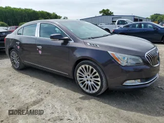 2014 Buick LaCrosse Premium II with VIN 1G4GF5G3XEF129714, listed as a Copart auction lot 58734075 with 140,024 mi miles and Salvage title. Bid and sale history available at DreamBid. Image 4.