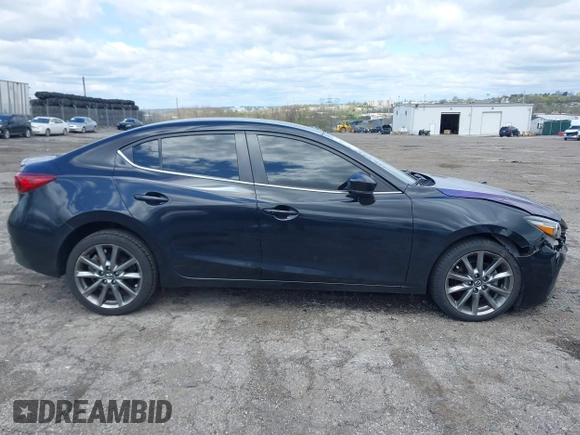 2018 Mazda 3 Touring with VIN 3MZBN1V35JM201844, listed as a IAAI auction lot 42051674 with 75,932 mi miles and . Bid and sale history available at DreamBid. Image 12.