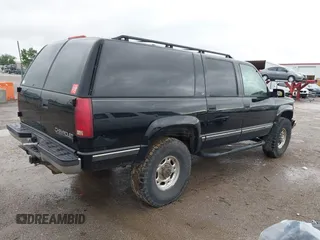 1999 Chevrolet Suburban with VIN 3GNGK26J8XG220021, listed as a IAAI auction lot 42145815 with 172,956 mi miles and . Bid and sale history available at DreamBid. Image 4.