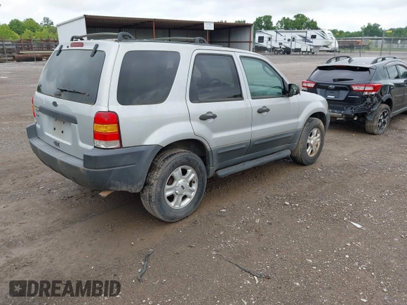 2003 Ford Escape XLT Popular z VIN 1FMYU03193KB02834, wystawiony jako IAAI lot #42423365 z przebiegiem 350 065 mil mil oraz . Historia ofert i sprzedaży dostępna na DreamBid. Obrazek 4.