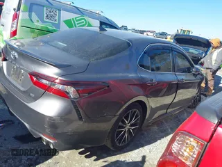 2023 Toyota Camry SE with VIN 4T1G11AK5PU116584, listed as a IAAI auction lot 41298269 with 28,994 mi miles. Bid and sale history available at carsss.com. Image 13.