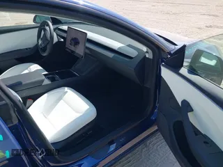 2025 Tesla Model 3 Long Range z VIN 5YJ3E1EB4SF876945, wystawiony jako IAAI lot #41518965 z przebiegiem 591 mil mil oraz . Historia ofert i sprzedaży dostępna na DreamBid. Obrazek 5.