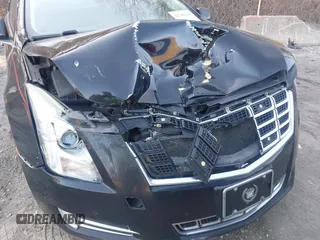 2013 Cadillac XTS Premium z VIN 2G61S5S38D9199459, wystawiony jako IAAI lot #41787638 z przebiegiem 171 298 mil mil oraz . Historia ofert i sprzedaży dostępna na DreamBid. Obrazek 6.
