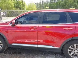 2019 Hyundai Santa Fe SE z VIN 5NMS23AD8KH025141, wystawiony jako IAAI lot #42209919 z przebiegiem 176 172 mil mil oraz . Historia ofert i sprzedaży dostępna na DreamBid. Obrazek 14.