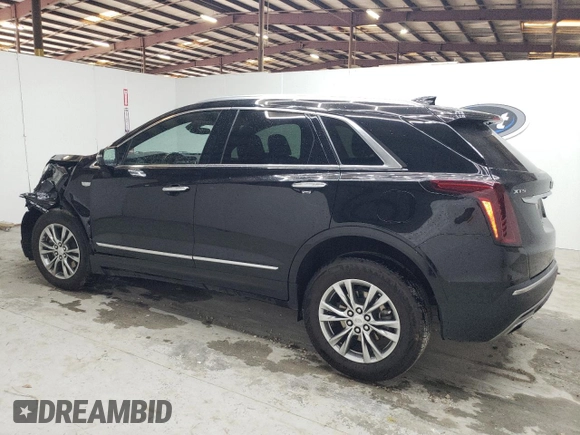 2023 Cadillac XT5 FWD Premium Luxury with VIN 1GYKNCRS6PZ171335, listed as a Copart auction lot 51859385 with 52,691 mi miles and Clean Title. Bid and sale history available at carsss.com. Image 2.