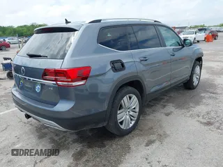 2019 Volkswagen Atlas SE z VIN 1V2WR2CAXKC611864, wystawiony jako IAAI lot #42151795 z przebiegiem 90 178 mil mil oraz . Historia ofert i sprzedaży dostępna na DreamBid. Obrazek 4.
