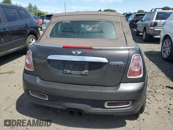 2013 MINI Convertible S with VIN WMWZP3C51DT551373, listed as a Copart auction lot 57878745 with 110,181 mi miles and Salvage title. Bid and sale history available at DreamBid. Image 6.