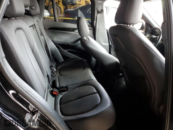 2018 BMW X1 sDrive28i with VIN WBXHU7C34J5L05725, listed as a Copart auction lot 49228475 with 69,994 mi miles and Salvage Title. Bid and sale history available at carsss.com. Image 10.