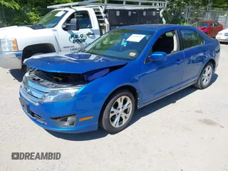 2012 Ford Fusion SE z VIN 3FAHP0HG4CR276627, wystawiony jako IAAI lot #42348303 z przebiegiem 160 922 mil mil oraz . Historia ofert i sprzedaży dostępna na DreamBid. Obrazek 18.