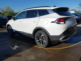 2023 Kia Sportage EX with VIN KNDPVCAG5P7077588, listed as a IAAI auction lot 42021931 with 26,195 mi miles and . Bid and sale history available at carsss.com. Image 3.