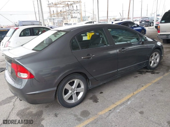 2010 Honda Civic Sdn LX-S with VIN 19XFA1F63AE065877, listed as a IAAI auction lot 41884982 with 195,939 mi miles. Bid and sale history available at carsss.com. Image 4.